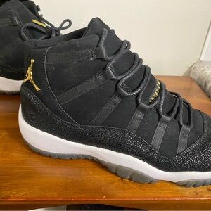 Jordan Black and Gold High-Top Sneakers